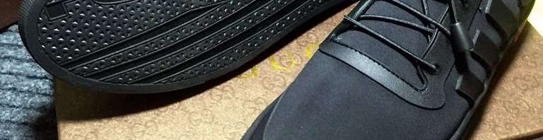 Tênis preto em couro Gucci